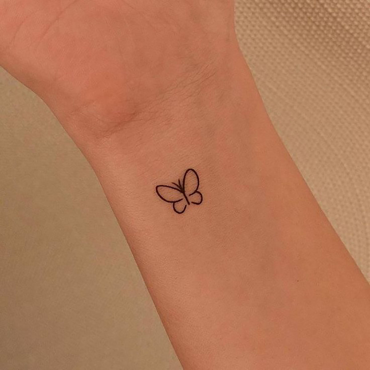 مدل تتو مینیمال مچ meaning